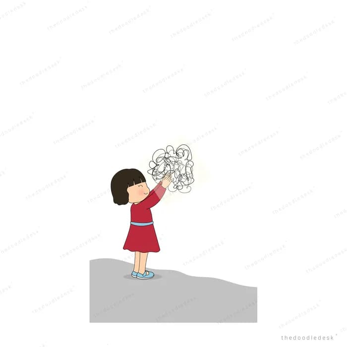 Small girl in a red dress on a grey rock holding up a tangled grey scribble