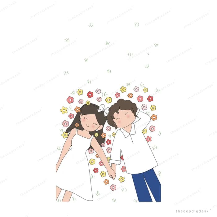 Girl and boy lying side by side on white bedding scattered with small flowers