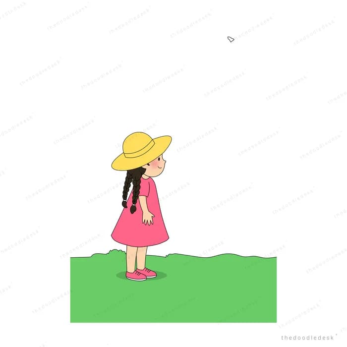 Girl in a pink swimsuit and straw hat lying on a green beach towel
