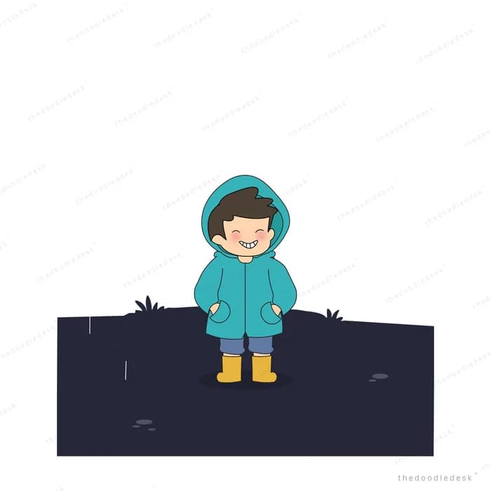 Boy in a teal hooded raincoat standing alone on dark rainy ground