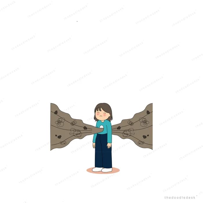 Girl in teal standing between two dark rock walls closing in around her