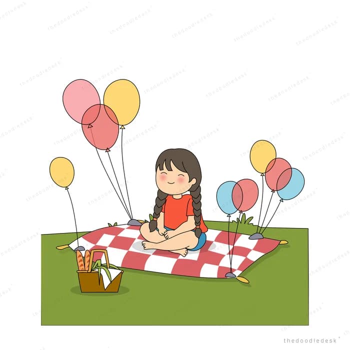 Girl sitting on a checkered picnic blanket with balloons and a basket on grass