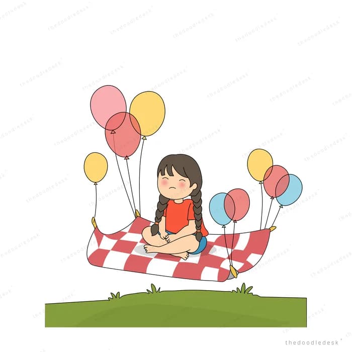 Girl seated on a checkered blanket holding balloon strings
