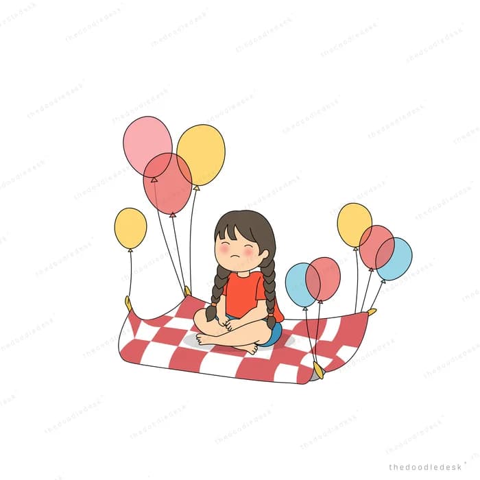 Girl sitting cross-legged on a red checkered picnic blanket with balloons around her