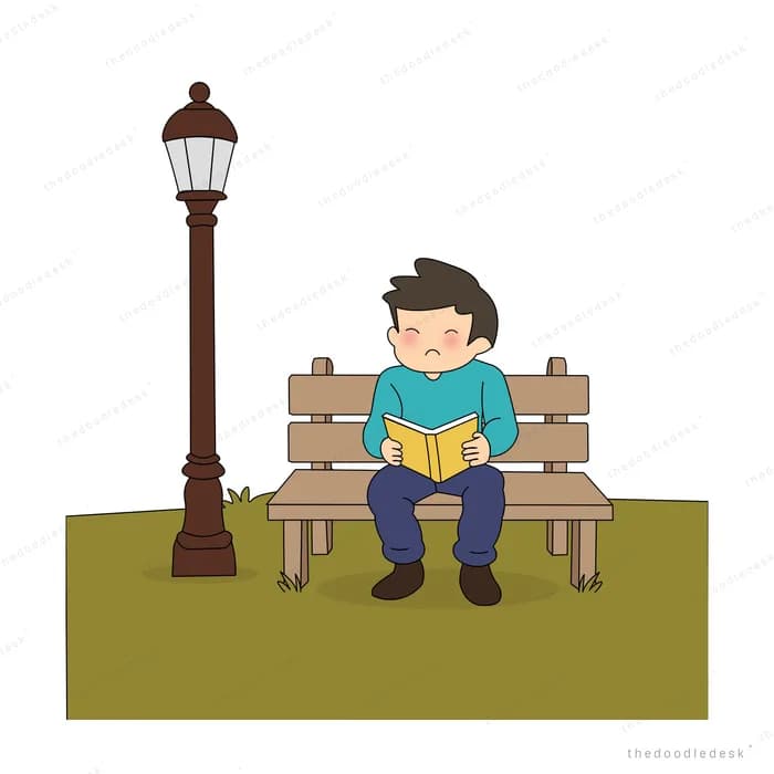 Boy sitting alone on a park bench beside a tall street lamp
