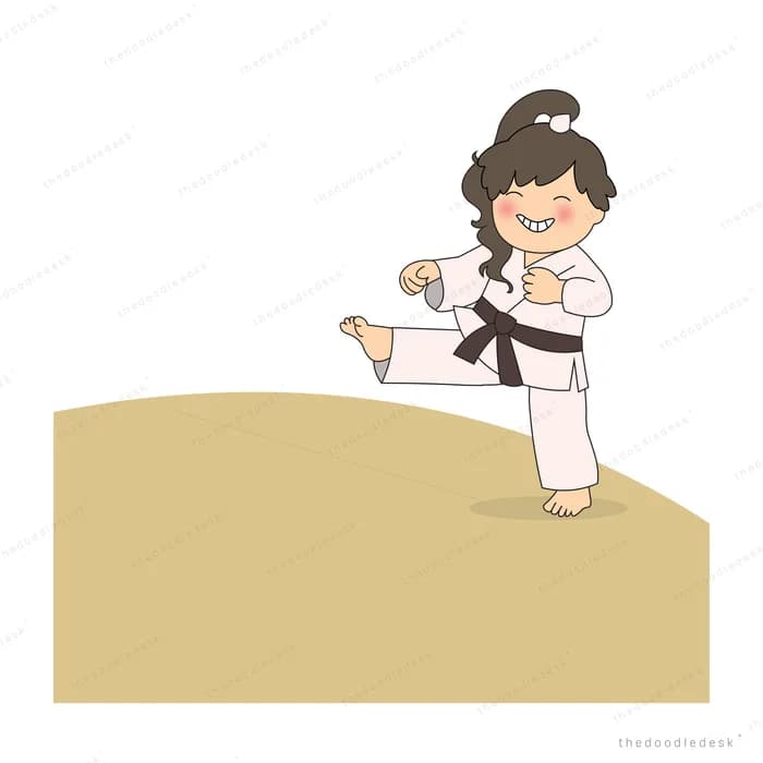 Girl in a karate gi taking a stance on a sandy hill