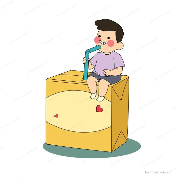 Boy sitting on a large yellow box sipping a drink through a straw