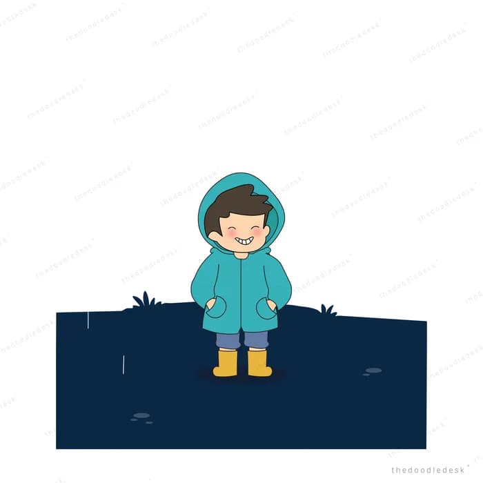 Boy in a teal hooded raincoat standing on a dark ledge at night