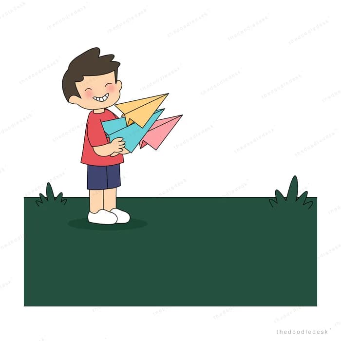 Boy hugging an armful of folded paper planes