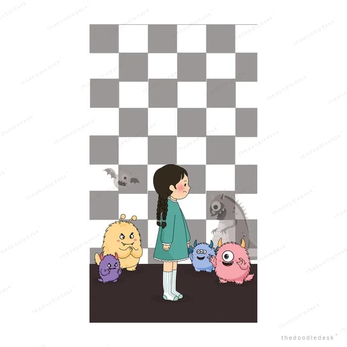 Girl looking down at toys arranged around her on a dark floor