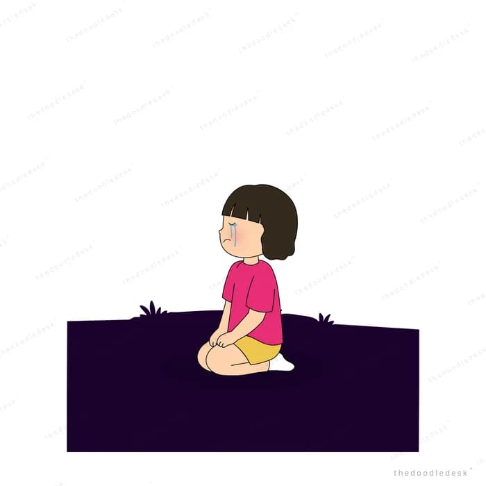 Girl sitting alone cross-legged on a dark purple mat
