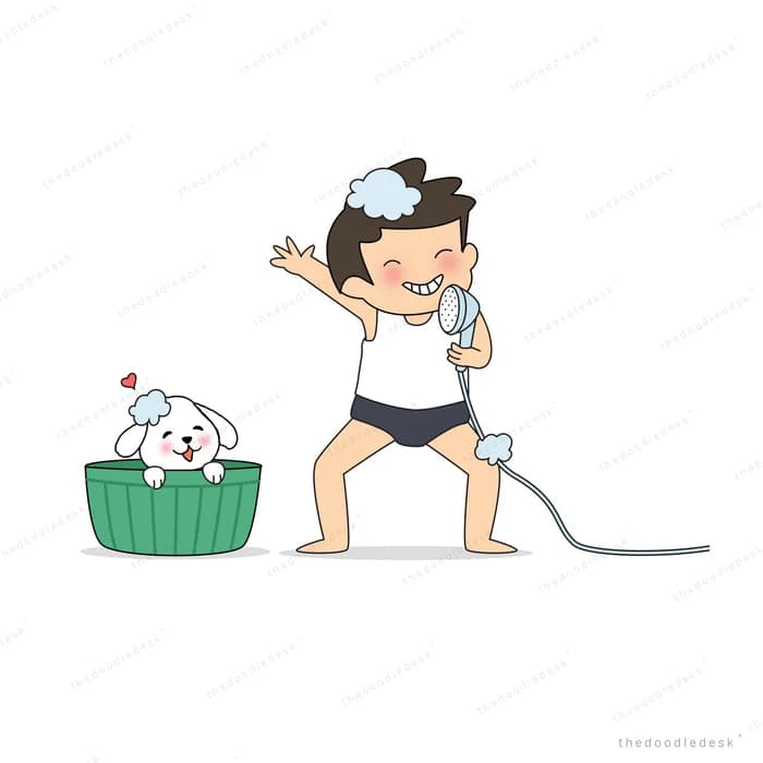 Boy washing a dog in a tub with a hose