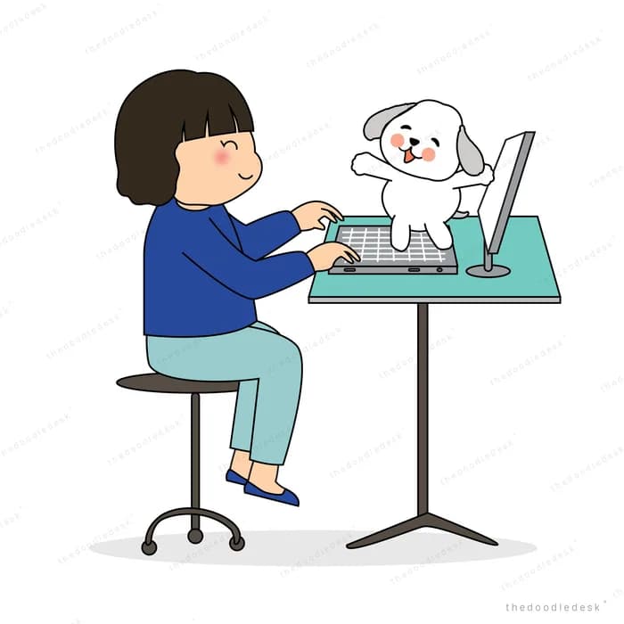 Girl at a desk on a computer with her dog