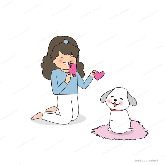Woman kneeling to feed her dog on a mat