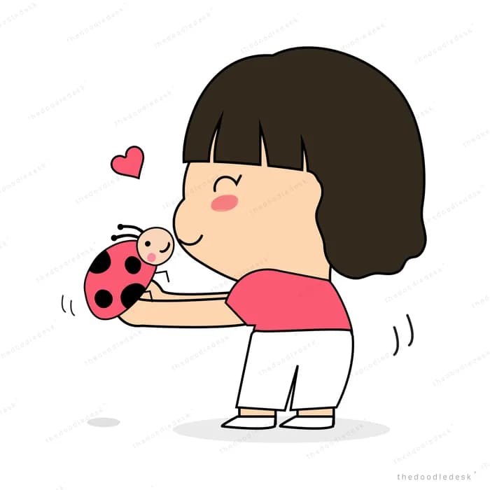 Girl bending to hold a ladybug in her hands