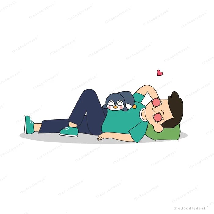Man lying on the floor with a cat on his chest