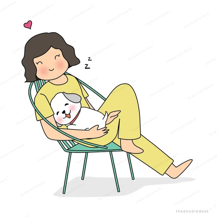 Woman asleep in a chair holding her dog