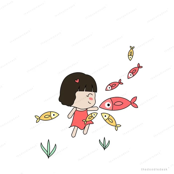 Girl swimming underwater among small fish