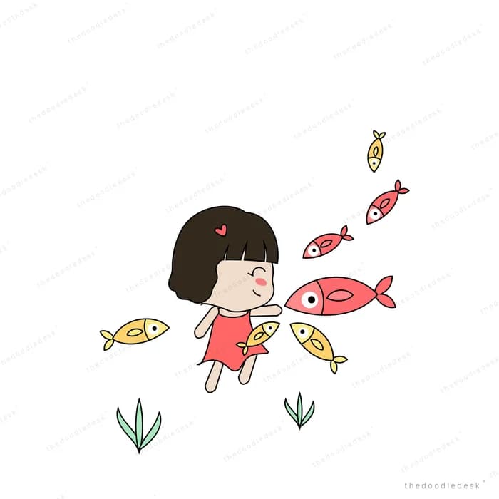 Girl swimming underwater among small fish