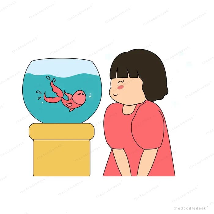 Girl watching goldfish in a round bowl