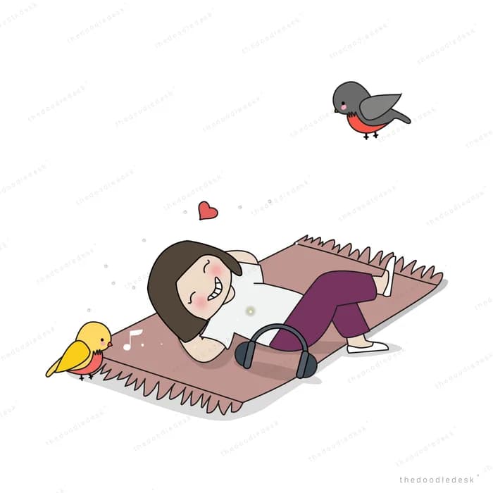 Girl lying on a giant spiral notebook with a chick and a bird nearby