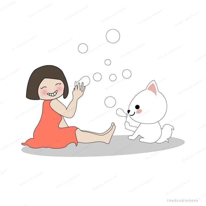 Girl in a red dress sitting on the floor blowing bubbles with a white cat