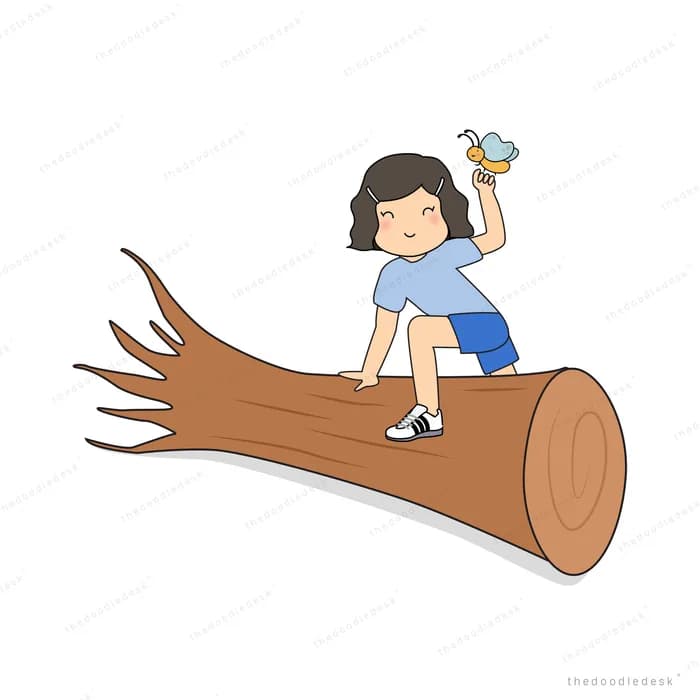 Girl sitting on a fallen log holding up a small bird
