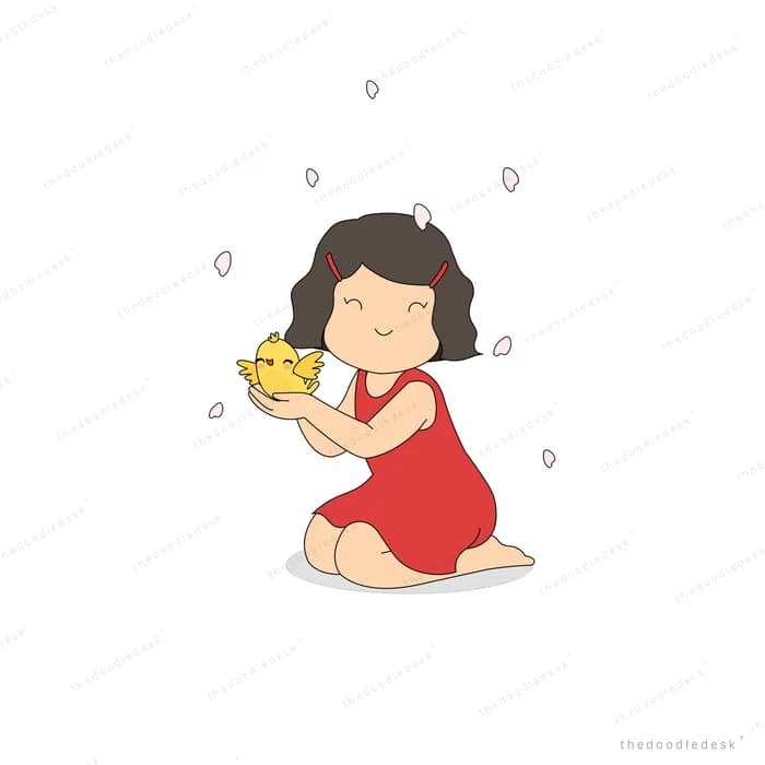 Girl kneeling and cupping a small chick in her hands