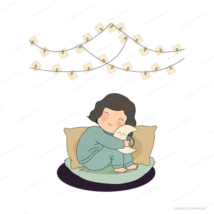 Girl sitting on a floor cushion cuddling a white cat under a string of fairy lights