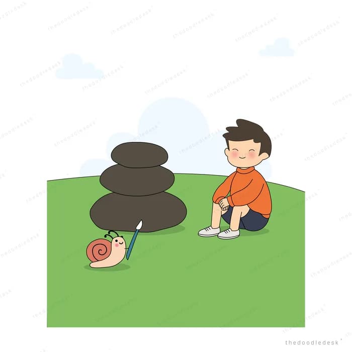 Boy sitting on a lawn beside a tall stack of balanced stones with a snail nearby