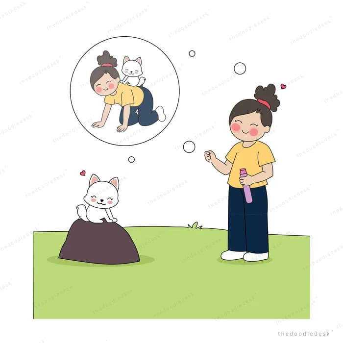 Boy in yellow blowing a large bubble that carries a white kitten aloft